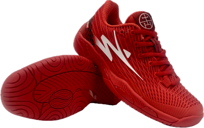 Red athletic sneakers with textured sole and white lightning bolt design, displayed on white background.